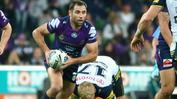 Storm captain Cameron Smith runs with the ball during the preliminary final loss to North Queensland