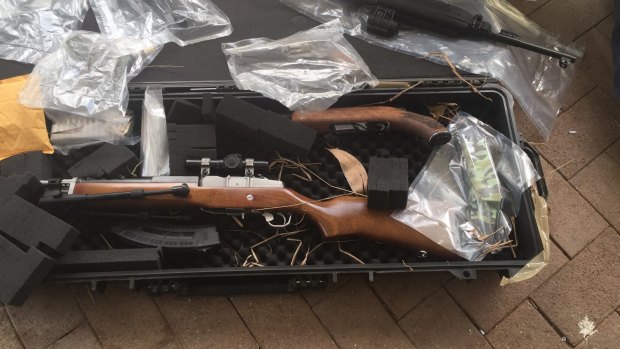 Queensland Police Taskforce Maxima officers and Border Force seized weapons during a raid at Clear Mountain, Queensland.
