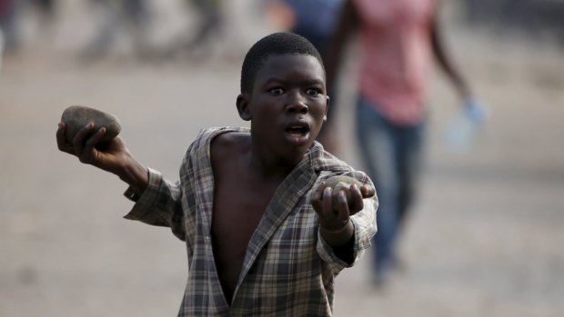 A boy at a protest on Tuesday against Burundi President Pierre Nkurunziza 