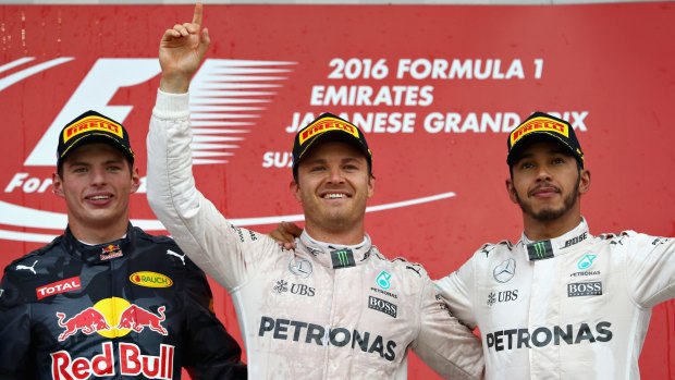 Top three: Nico Rosberg, centre, with runner up Max Verstappen, left, and third placed Lewis Hamilton.