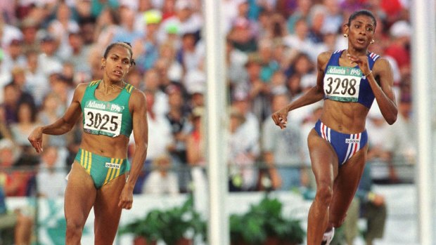 Australian runner Cathy Freeman in action against French runner Jose-Marie Perec at the Atlanta Olympics, where she won silver in the 400m.