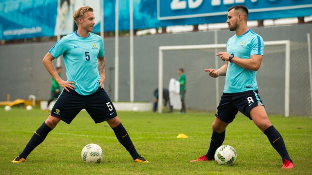 Socceroos Jimmy Jeggo (left) and Bailey Wright at training in Honduras.