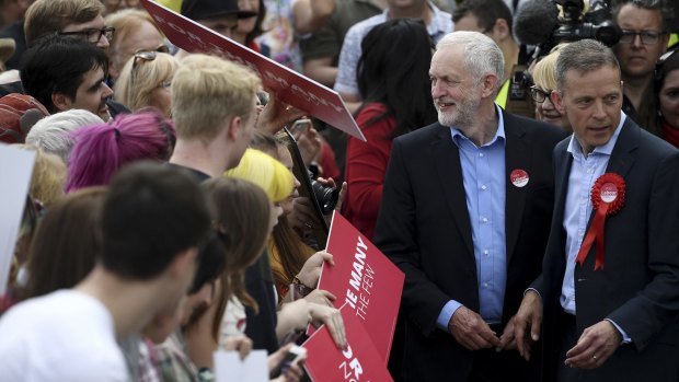 Labour leader Jeremy Corbyn greets supporters during a campaign event in Reading.