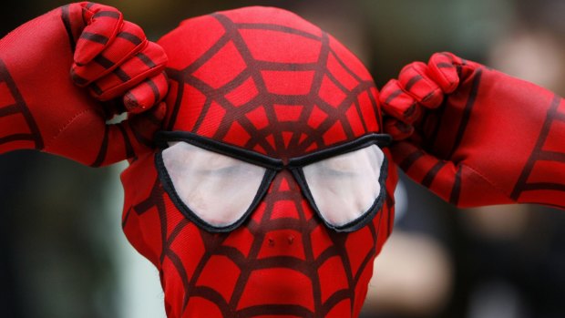 Police are searching for a man dressed as Spider-Man.