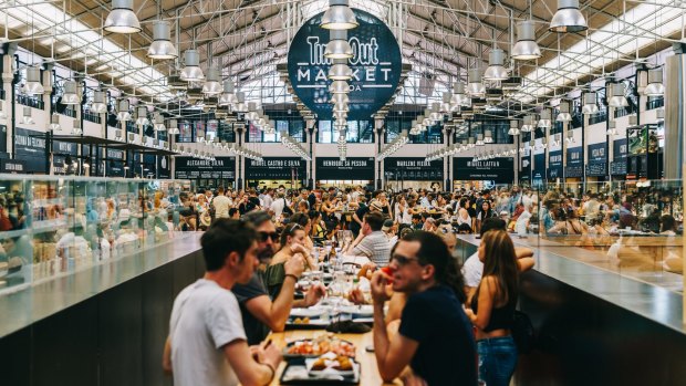 Time Out Market is a food hall located in Mercado da Ribeira at Cais do Sodre in Lisbon.