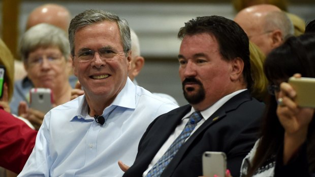 Republican presidential candidate  Jeb Bush with Nevada Republican Party Chairman Michael McDonald on Saturday.