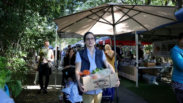 Crowds flock to the weekly Davies Park farmers market in West End.
