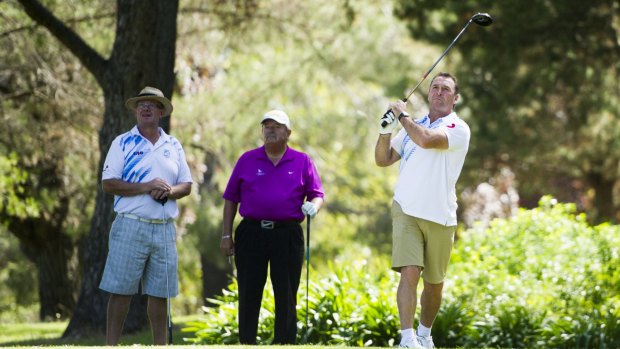 Ricky Stuart tees off at his Foundation Golf Day last year.