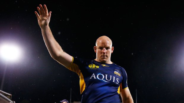 Sad farewell: Stephen Moore leaves the field for the last time as a Brumbies player.