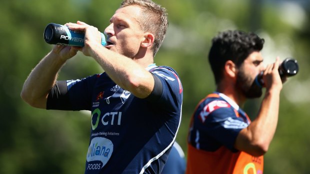 Besart Berisha of Melbourne Victory drinks during training.