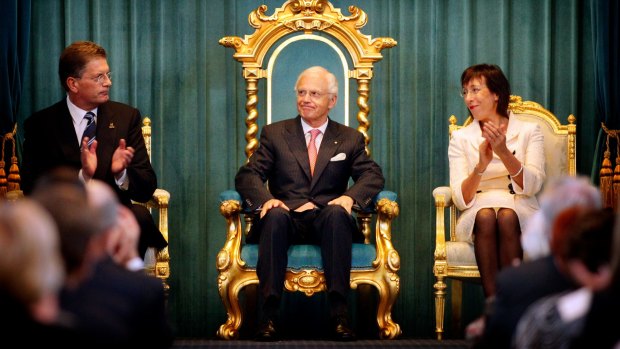 Premier Ted Baillieu, left, and Chief Justice of the Supreme Court of Victoria Marilyn Warren applaud Alex Chernov as he is sworn in as governor on April 8, 2011.