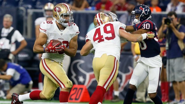 Cisco kid: Jarryd Hayne (left) rushes during a pre-season game with the San Francisco 49ers.