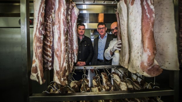 The award winning smoke-house Pialligo Estate has moved to a new location in Fairbairn after a fire gutted the building they were in. Checking out the new digs are general manager Charlie Costelloe, director Rowan Brennan and Smokehouse manager Alex Petryk, right.