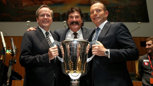 Opposition Leader Bill Shorten, AFL legend Robert DiPierdomenico and Prime Minister Tony Abbott during a Parliamentary Friends of AFL function in August.