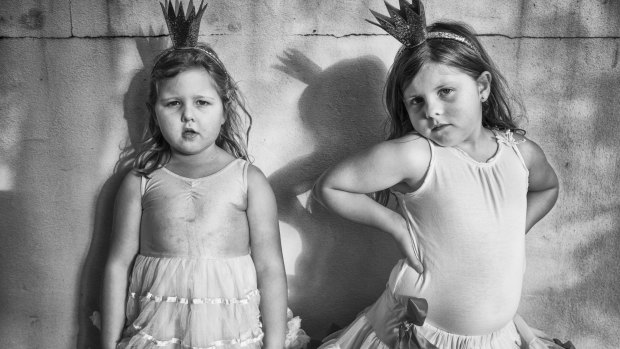 Sisters Isla and Elki role-play as princesses, (2015), by
Natalie Grono.
