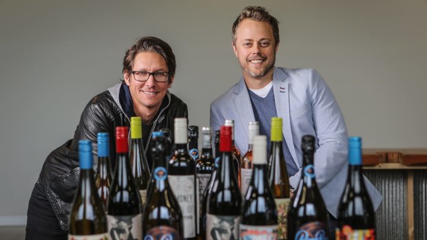 Vinomofo co-founders Andre Eikmeier (L) and Justin Dry pose for a photo at the online wine retailer's headquarters in Melbourne. 
