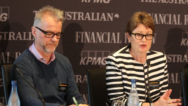 Catherine Livingstone, seen here with Tony Sheldon at the National Reform Summit, wants bi-partisan support for the big expenditure and tax policies to take effect over the next 10 years.