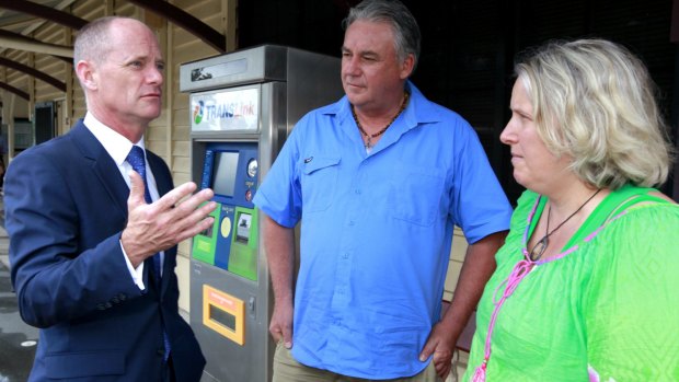 Premier Campbell Newman speaks with locals at Landsborough station on Tuesday.