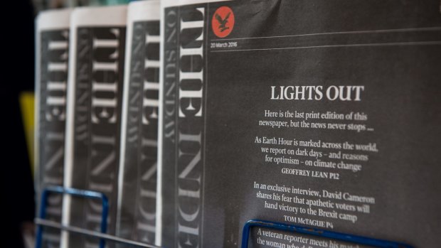 Copies of the final print edition of The Independent on Sunday sit on a stand outside a newsagents in Soho, London, on March 20.