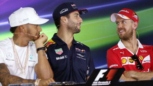 Mercedes driver Lewis Hamilton, (left), Australia's Red Bull driver Daniel Ricciardo, and Ferrari driver Sebastian Vettel have seen a drastic shake-up in F1 in the off-season.