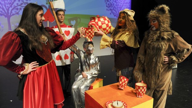 The Scarecrow (Charlotte Gee), the Queen of Hearts (Shaylah McClymont) and the Lion (Karissa Nicholson) take time for tea.