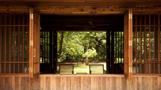 With its timber shutters, the atmosphere at Bijoy Jain's Copper House 2 is the same inside and out.