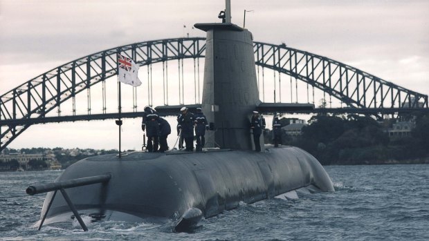 A Collins Class submarine sails through Sydney Harbour.