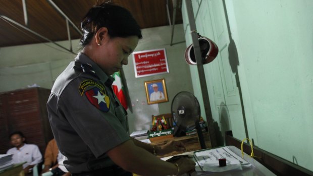 A Myanmar police officer votes in Naypyitaw on Thursday ahead of the November 8 general elections.
