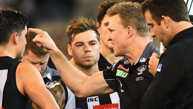 Laying down the law: Nathan Buckley was irate at quarter-time.