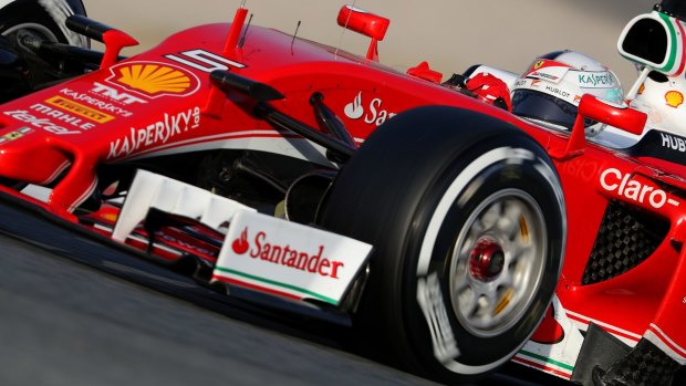 Ferrari's Sebastian Vettel drives during testing at Circuit de Catalunya.