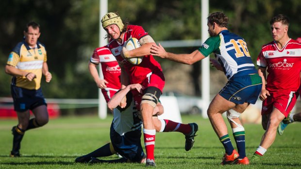  Tuggeranong flanker Ben Hyne charges the Uni-Norths defence.