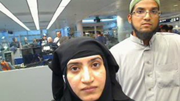 Tashfeen Malik and Syed Farook, as they passed through O'Hare International Airport in Chicago, in July 2014. 