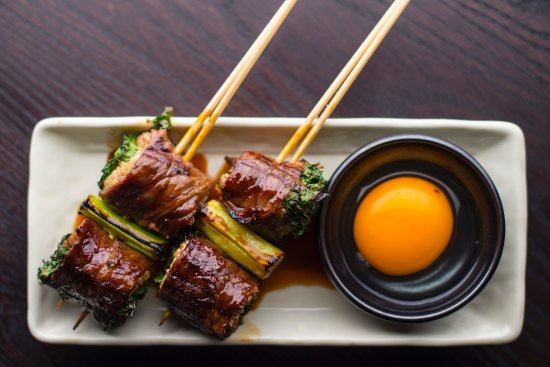 Sukiyaki skewer (wagyu beef) with raw egg yolk at  Goryon-San.