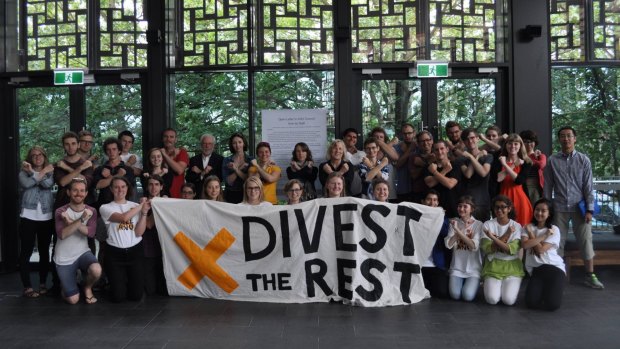 Anti-fossil fuel campaigners at Australian National University on Tuesday.