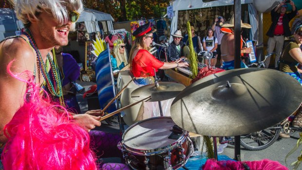 Members of Crazy Old Maurice's Disco Bike Revolution kept the festival's streets humming with music. 