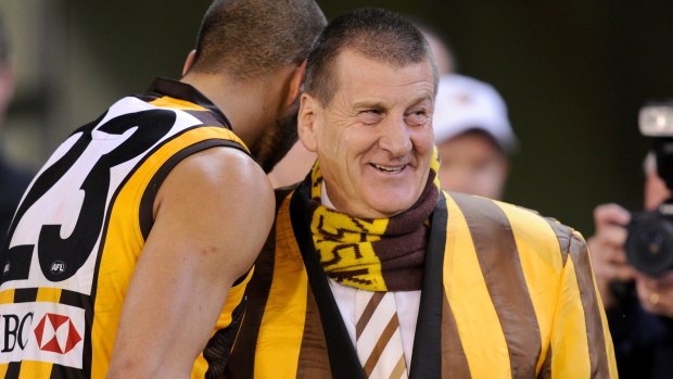 Earning stripes: Lance Franklin celebrates with Jeff Kennett after victory over Sydney at the MCG in 2011.