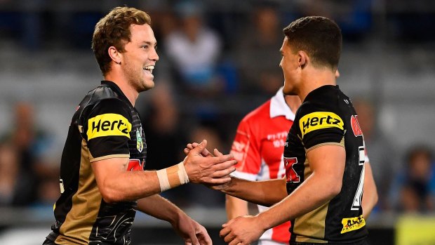 In form: Matthew Moylan celebrates after scoring a try with Nathan Cleary as the Panthers beat the Gold Coast Titans to lock in an NRL finals berth.