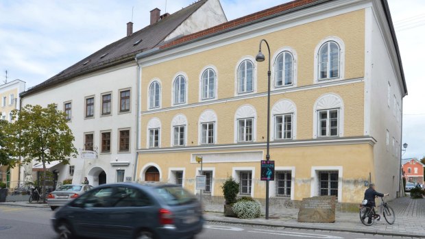 Adolf Hitler's birth house, yellow, in Braunau am Inn, Austria.
