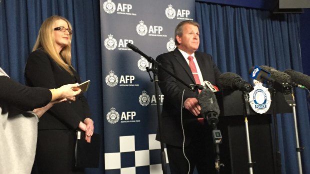 Meg Brighton, deputy director-general of the ACT Education Directorate, and Detective Acting Superintendent Marcus Boorman address a press conference regarding the allegations of a child pornography ring involving Canberra schools.