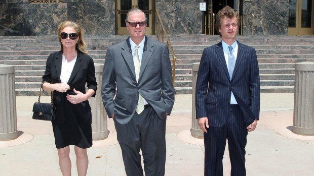 Conrad with parents Kathy and Richard attend court in June last year. (Photo by David Buchan/Getty Images)