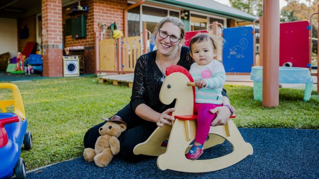Fyshwick Early Childhood Centre director Anna Rice with 11-month-old Matilda Banlusak. After 25 years the much-loved centre is closing.


