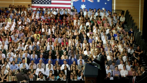 Students listen to US President Barack Obama at the University of Queensland.