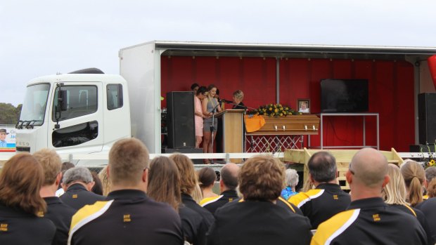 Hundreds of members of the Esperance community linked arms in solidarity as Mr Curnow's coffin was carried before them.