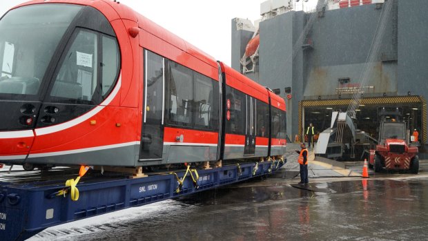 Canberra's first tram is transported on to a ship.