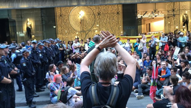 Police and protesters at Sydney's Pitt Street Mall on Thursday.