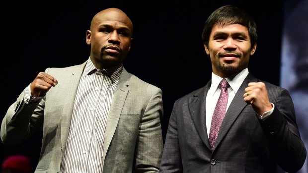 Boxers Manny Pacquiao (right) from the Philippines and Floyd Mayweather from the US.