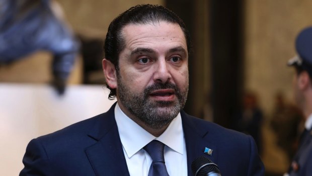 Lebanese Prime Minister Saad Harri reads a statement after his meeting with Lebanese President Michel Aoun.