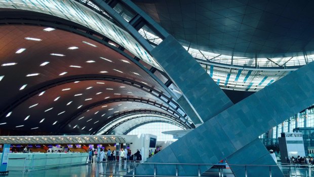 The striking, curving architecture of Hamad International Airport, in Qatar, is designed to represent ocean waves and sand dunes.