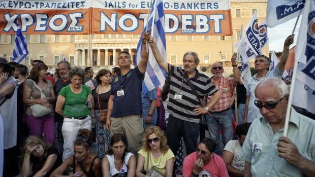 Anti-austerity protesters gather outside the Greek parliament building in Athens. A referendum on  Sunday will decide whether their government should accept an economic reform package put forth by Greece's creditor. 