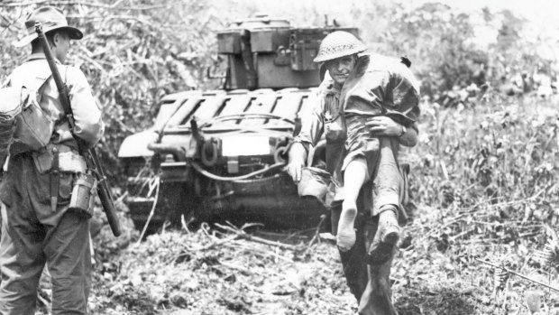 Australian troops moved in behind Matilda tanks for the dawn attack on the Japanese held village of Sattelberg in 1943 during the New Guinea campaign.